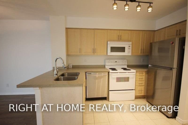 30 Harrison Garden Boulevard, Unit 207 thumbnail 2
